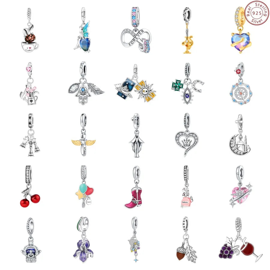 Grid of assorted sterling silver charm pendants with colorful enamel and crystal details on a white background